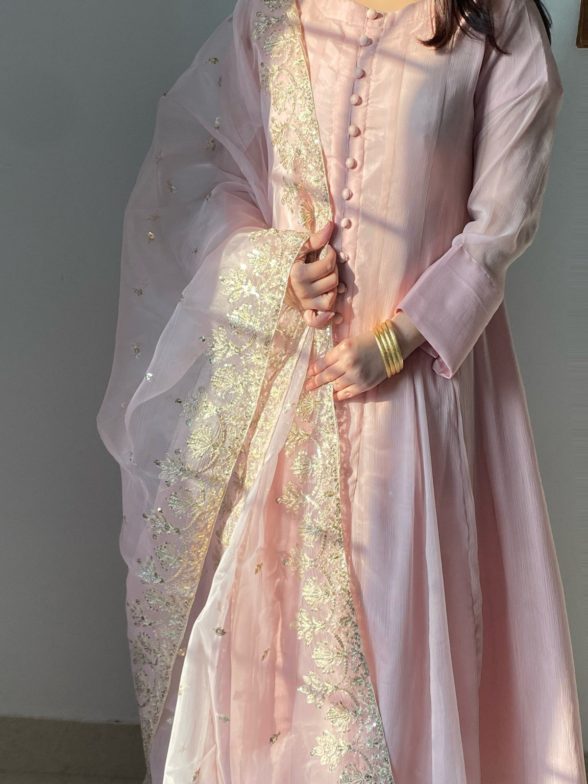 Blush pink chiffon open maxi kurta with gold-and-pearl embroidered panel — front view